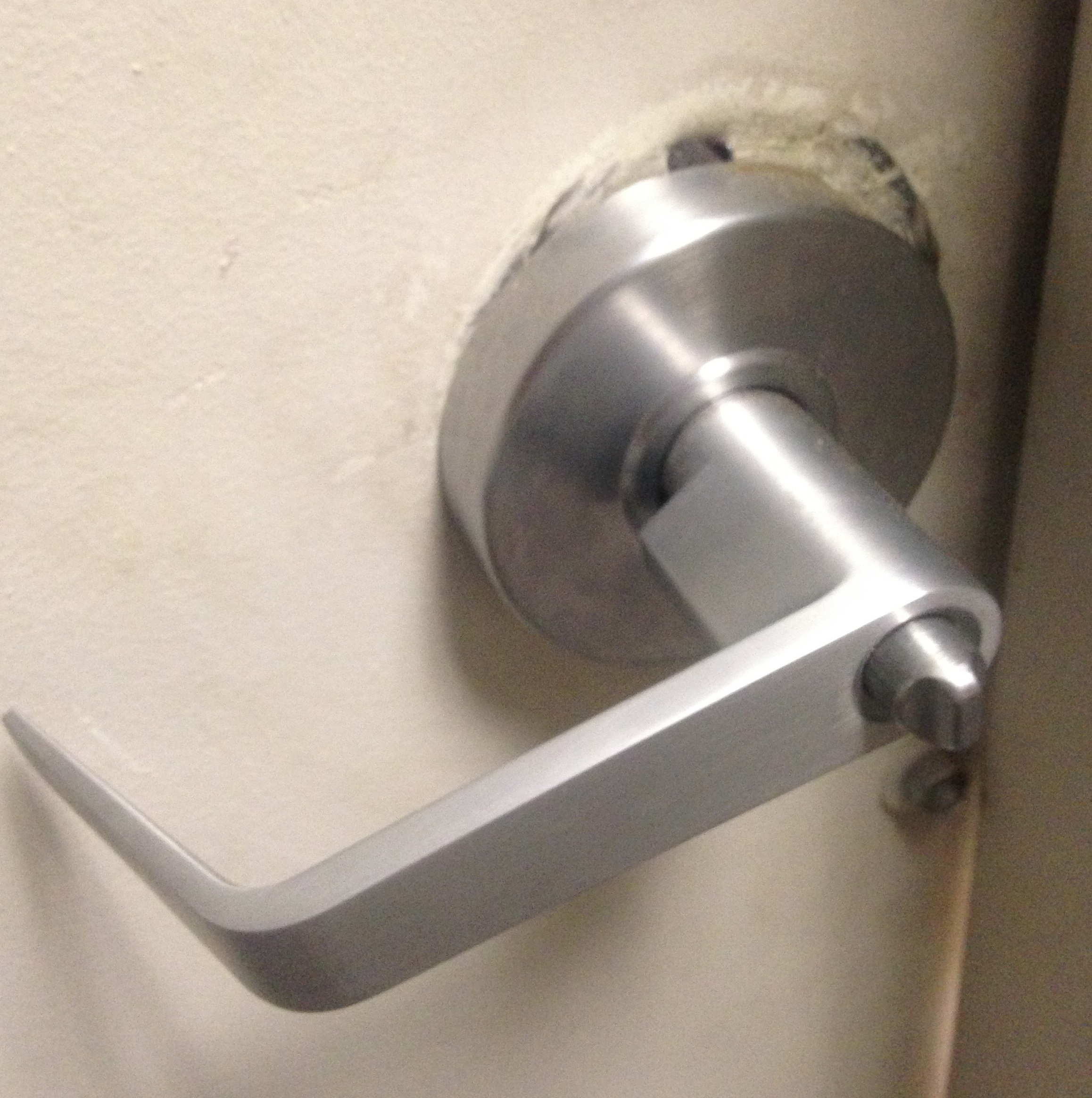 Broken/Worn out door handle.